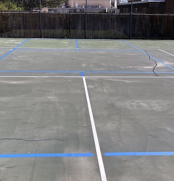 tennis court converted to pickleball court with line markings