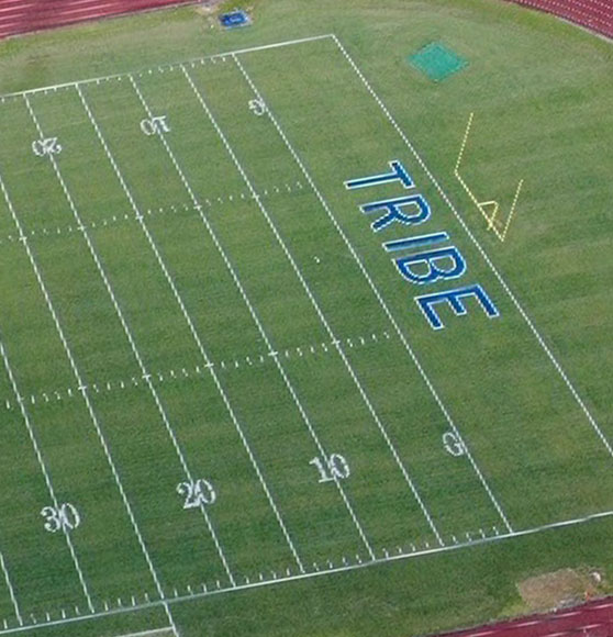 aerial view of football field after end zone marking painted
