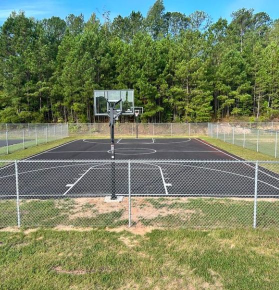 front view of Coweta County Parks basketball courts freshly painted