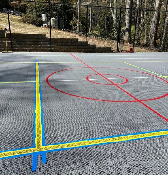 close-up of pickleball markings freshly painted for private residence
