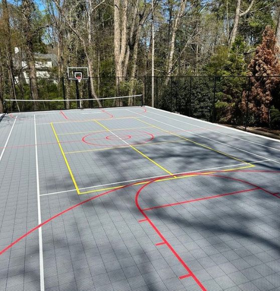 private residence with freshly painted pickleball court