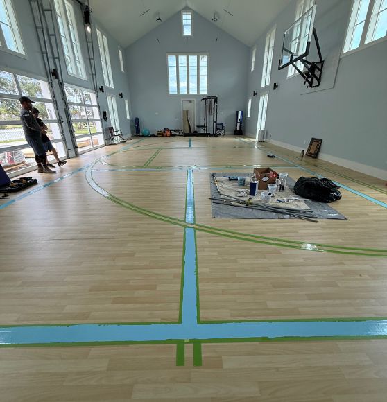 Private Residence gym with tape and paint