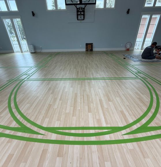 Private Residence gymnasium taped up before painting begins