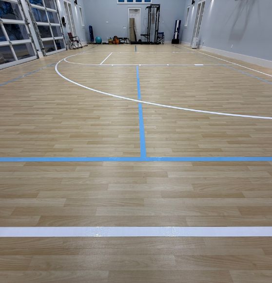 close-up of freshly painted line markings for basketball court