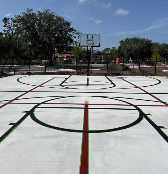 front view of St. Augustine University pickleball court with freshly painted line markings