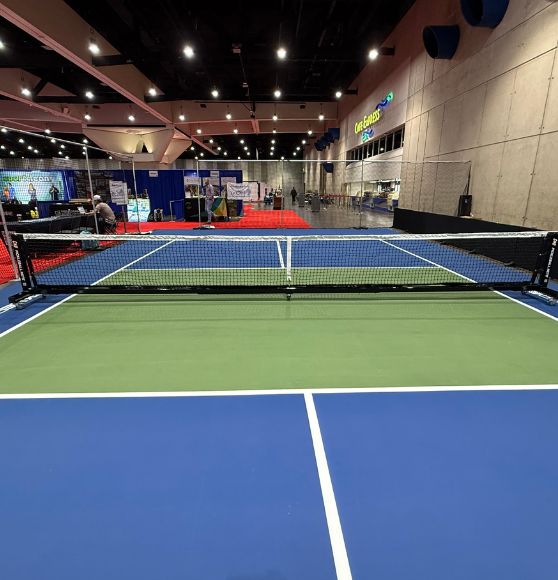 Athletic Business Show 2025 with freshly painted pickleball court