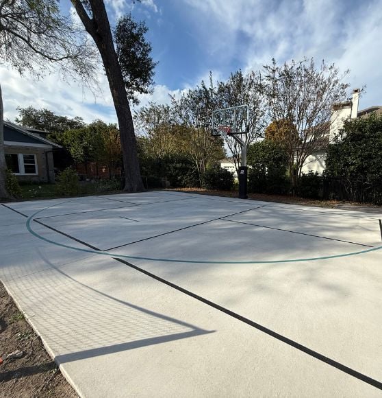 side view of pickleball and basketball court freshly painted