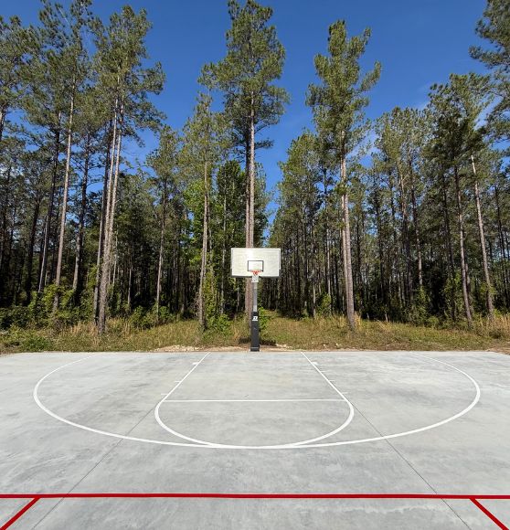 basketball court with freshly painted line markings for private homeowner