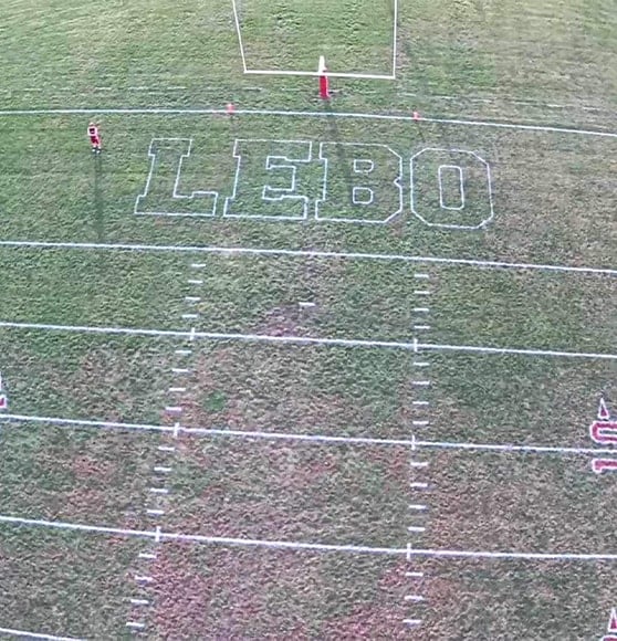 Lebo High School football field end zone freshly painted