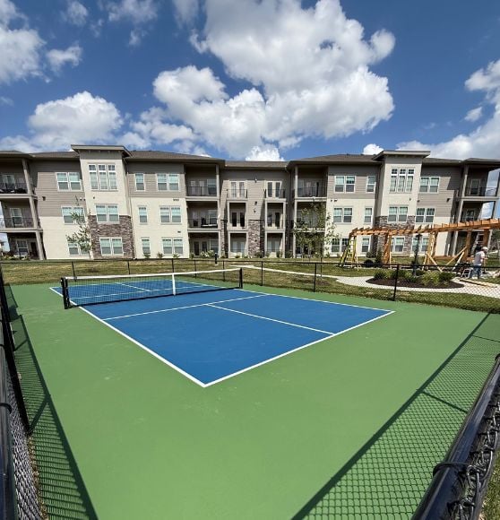 freshly painted pickleball court for a Property Management Group