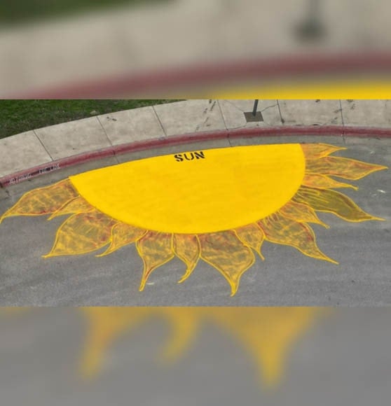 a sun freshly painted on playground