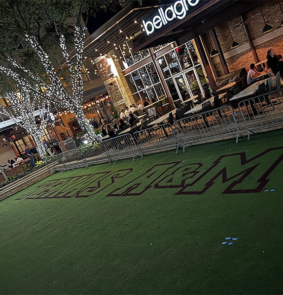 close-up of event logo on football field