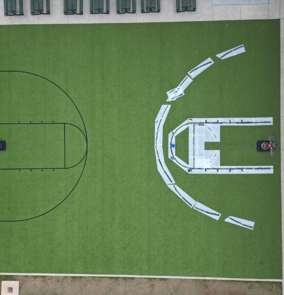 aerial view of Great Hearts Invictus basketball court in the process of getting painted