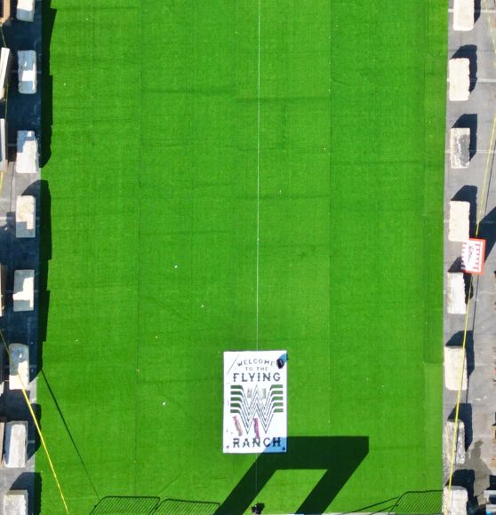 Stock Show and Rodeo Flying W Ranch field with no line markings