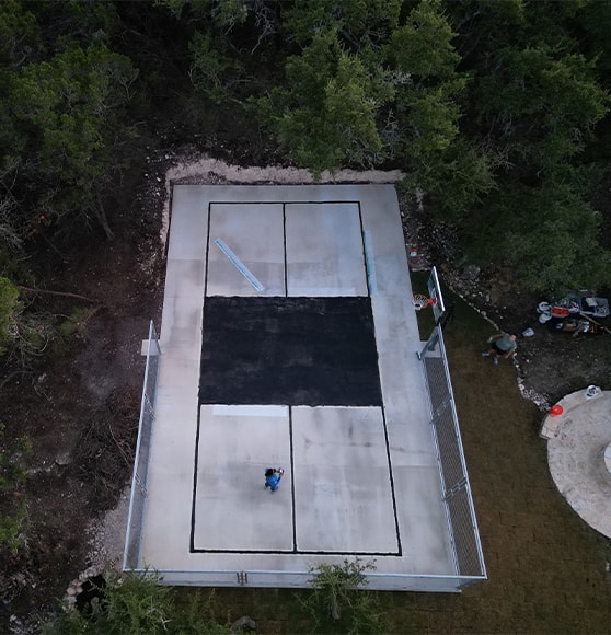 homeowner basketball court freshly painted