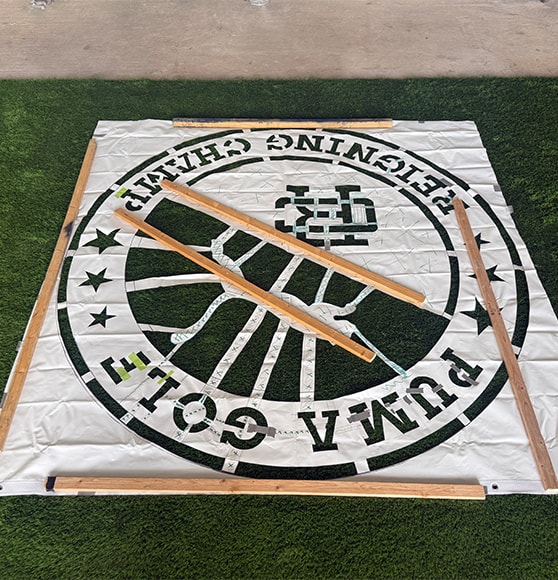 front view of logo installation in process