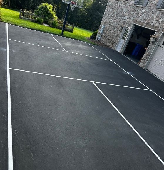 close-up of freshly painted pickleball court for Private Residence