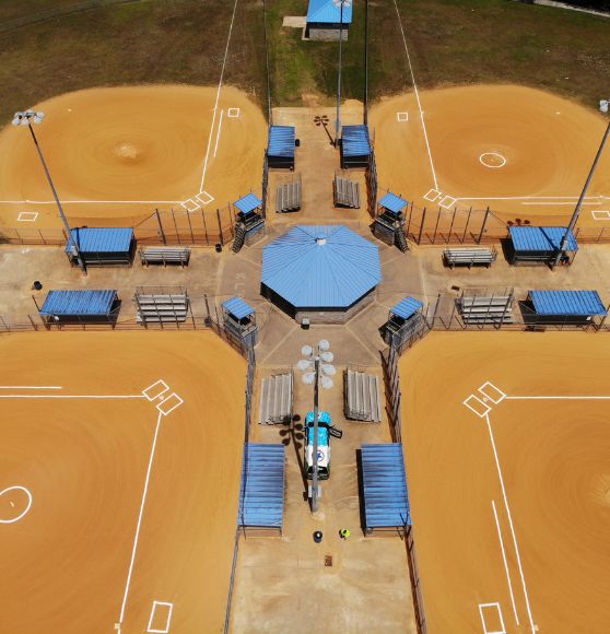 aerial view of multiple baseball fields freshly painted